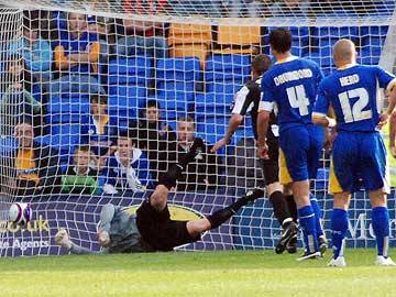 David Hunt looked to have earned Shrewsbury a point with his late free kick