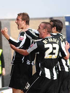 Glenn Murray celebrates Dale's second in front of the visiting fans