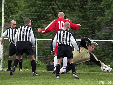 Goalmouth action ends with a superb save from the Birches goalkeeper