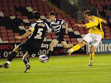 Steve Foster blocks Glenn Murray's shot