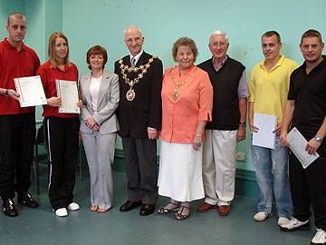 Middleton Leisure staff with their NVQ awards alongside Mayor & Mayoress of Rochdale, Peter & Helen Evans