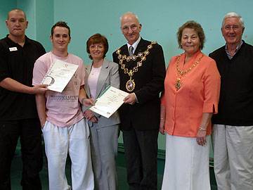 Heywood Sports staff with their NVQ awards alongside Mayor & Mayoress of Rochdale, Peter & Helen Evans