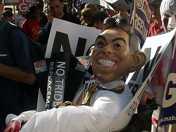 the ‘Blair-in-a-bin’ effigy amongst protesters in Manchester