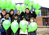 Photo of cast of Andrews Angry Words outside the new theatre.