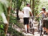 Couple on a woodland bike ride