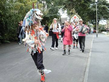 The Morris 'hobby-horse' leads the procession