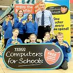 Pupils from St Edwards join manager Matt Fowler in launching Tesco Computers For Schools