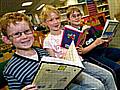 Young bookworms enjoying reading