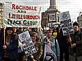 peace group members, Thomas Gilligan, Kate Crawford, Peter Underdown Pauline Devine, and Tom Jones with the new banner in Trafalgar Square.  