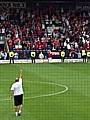 Walsall manager Richard Money shows his delight in front of the Walsall fans