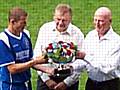 Oldham captain Chris Swailes is presented with the Rose Bowl by Rochdale Chairman Chris Dunphy and Oldham Chairman Barry Chaytow