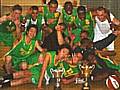 A Proud Basketball Team show off their trophies