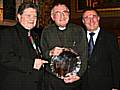 Father Arthur Neary presented with the Rochdale Man of the Year Plate