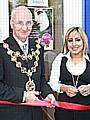 Cutting the ribbon: Rochdale Mayor, Councillor Peter Evans with 'Ashi's' owner Asma Akhtar