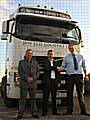 JPM Eco Logistics directors with one of the haulage firm's eco lorries.