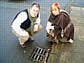 Councillor Dale Mulgrew and Liz Thirsk inspect a gully in their area