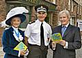 Chief Constable Peter Fahy, William Roache and the High Sheriff of Greater Manchester, Edith Conn launch the book giveaway on Coronation Street.