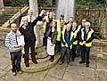 Rochdale Council’s Dave Woolrich, Andrew Whitehead, and Councillors William and Wera Hobhouse hold the North West In Bloom Heritage Award trophy aloft at Packer Spout.