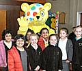 Pudsey Bear from the BBC’s Children in Need with pupils from Shawclough Community Primary School.