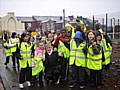 Pupils from St John Primary School with Groundwork staff on the clean up on Ann Street.