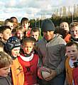 St Helens ace Kyle Eastmond talks with local youngsters at October's Half Term Total Rugby Camp.