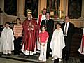 Archbishop Paul Gallagher, the Apostolic Nuncio to Burundi and parishioners of St Joseph’s Heywood confirmed at Mass with Father Paul Daly in the background and Heywood MP Jim Dobbin on the right