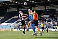 Lee Thorpe was injured in this clash with Grimsby's goalkeeper