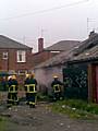 Rochdale Fire Brigade deal with fire at garages behind Woodstock Street 