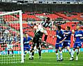 Rory McArdle heads in Rochdale's first goal