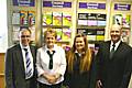 Councillor Keith Swift (left) unveils the new uniforms modelled by Customer Service Officers Janet Davidson, Siobhan Carey and Assistant Customer Service Manager John Foley