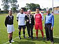 Rochdale Mayor Robin Parker as the two team captains, the referee and councillor Sharif look on