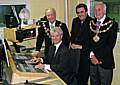 Station manager Bob Chadwick, sitting, with, from left, the Mayor of Rochdale, Councillor Robin Parker, BBC Radio Manchester presenter Eamonn O’Neal and the Mayor of Bury, Councillor Peter Ashworth.