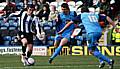 Toner in action against Dale during last season's game against Grimsby at Spotland