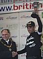 Chris Newton celebrates his Rochdale Grand Prix win this year with Deputy Mayor Councillor Keith Swift.