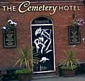 Graffiti on the front door of the Cemetery Hotel