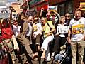 Councillors and members of the public waggle their toes in protest at the closure of Buersil Post Office during a barefoot protest march earlier this month