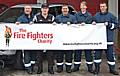 Boxer Ricky Hatton with firefighters ahead of this weekend's charity car wash.