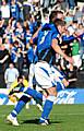 Tom Kennedy wheels away towards the Dale dugout after his 95th minute winner.