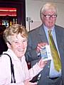 Rochdale MP Paul Rowen gives away free lightbulbs to a Mecca Bingo member.