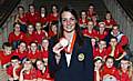 Keri-Anne Payne at the Town Hall with her Olympic silver medal and youngsters from the Aquabears swimming club.