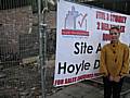 Wera Hobhouse at the site of the old Norden Fire Station, where Hoyle Developments have put up new signs pending their development of the site.