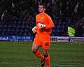 Loanee Tom Heaton warms up for the second half