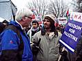 Paul Rowen speaks to a Palestinian student during the weekend rally.