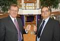 Chairman of NHS Heywood, Middleton and Rochdale, John Pierce (left) accepts the keys from Eric Wright Group's Project Co-ordinator, John Dean (right).