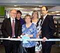 Jim Dobbin MP for Heywood and Middleton cuts the ribbon to Darnhill Library, with Kathleen Chorlton from Darnhill Residents group, Library staff Shelia Sfrijan and Ann Jones and Councillor Colin Lambert.