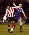 Jason Taylor (right) has been linked with a permanent move to Rochdale during the January transfer window.