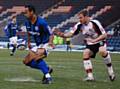 Chris O'Grady looks to turn part Terry Dunfield inside the Shrewsbury box.