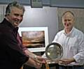 Rochdale Photographic Society's annual President's Print Competition was judged by the President, Andrew Hardwick (left), and awarded to Norman Holden for his print 'Sunset over Watergrove Reservoir'.