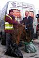 Cliff Ellison (left), of Groundwork, receives donated trees from Edward Redican, from the All-In-One Garden Centre.