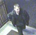 Image of a man police want to speak in connection with Heywood church robbery.